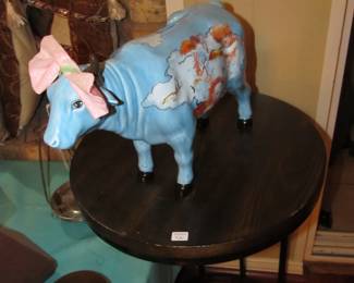 Cute ceramic cow bank. Don't worry, the pink bow we added, lol 