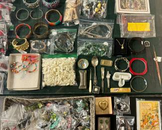 Postcards, Watches, Pens, Jewelry, and Other Trinkets