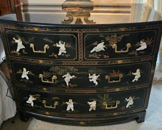 Asian Lacquered Chest with decorative scroll work on the top also.