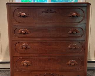Beautifully ornamented antique dresser