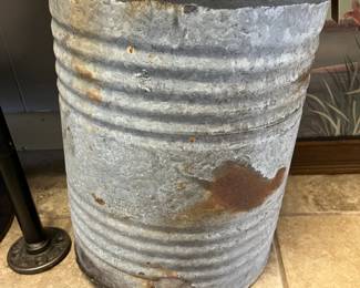 Antique metal jug with spout and handle