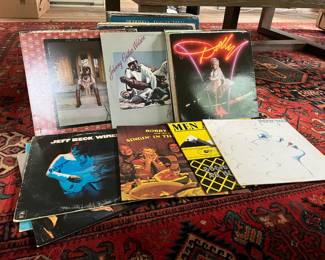 Vinyl records including Dolly Parton, Phoebe Snow, Jeff Beck, Emmylou Harris, Bobby Bare, Men at Work, Rod Stewart, Johnny Guitar Watson and More