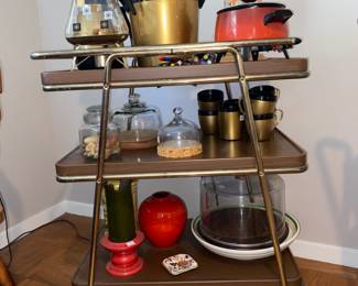 We have not one, not two but THREE of these rolling carts! One does need some love and attention though.