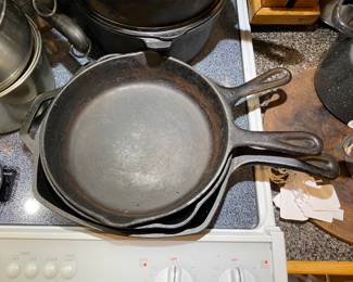 Great cast iron skillets. The bottom is a griddle 