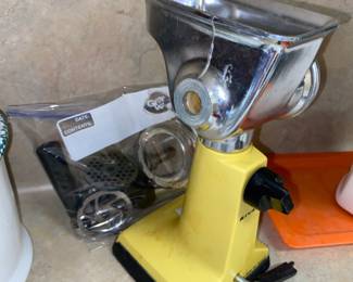 Cool vintage suction mount grinder with parts.