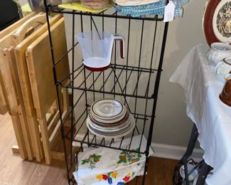 Folding metal shelf
