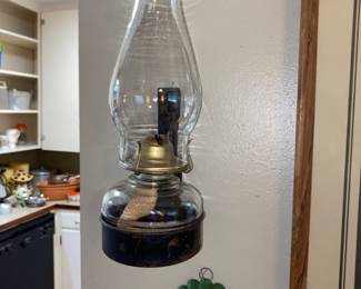 This hurricane lantern has it on wall hanging bracket.