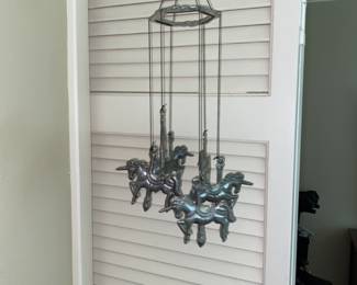 We have two of these Carousel horse windchimes.