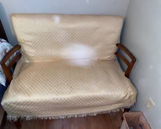 This vintage settee has a handmade cover but original orange fabric is under it. Very comfy and sturdy. A perfect project piece.