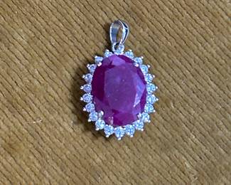 Sterling and gemstone pendant.