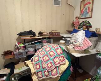 Antique quilts and afghans.