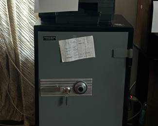 One of two safes, with combos and keys.