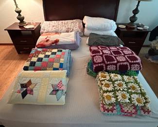 Antique quilts and afghans.