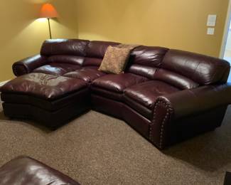 Leather Sofa w/ ottomans.