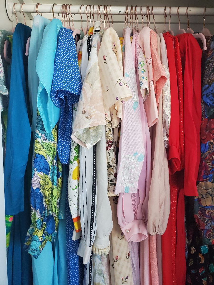 Plenty of beautiful vintage dresses and gowns (along with other pieces as well).