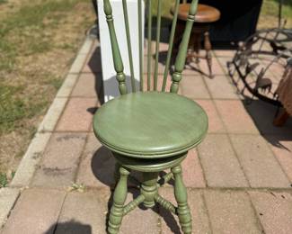 Antique piano stool glass feet. 