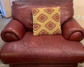 Leather chair. Oversized. Bought from Furniture Row. Matches lots 1000, 1001 and 1003. Bring help to load. Located in the basement
