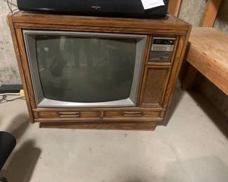 Magnavox console television. Located in basement. Nothing on top of t.v. is for sale