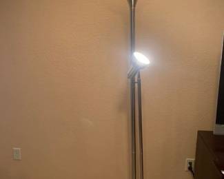 72 inch tall floor lamp. Duel lights. One side is adjustable