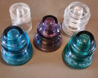 Insulators including rare purple color
