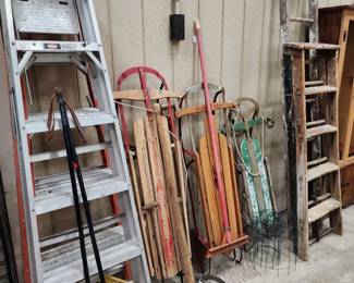 Vintage sleds and ladders