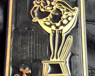 Metal pinup girl plaque