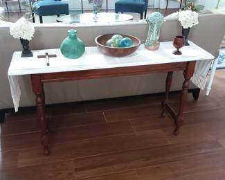 Sofa table with fun collectibles 