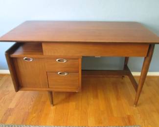 Walnut Desk with Floating Top, C-1960's.  Made by Hooker Furniture, USA in their "Mainline" Series, A take on Danish Design.  50" X 23" X 35"