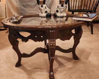 Carved table with removeable glass top tray