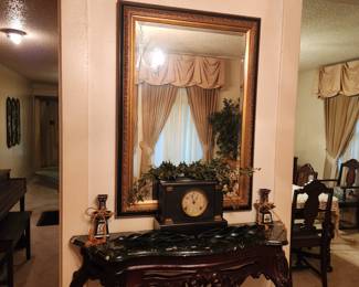 Large mirror, marble top carved entry table, antique clock