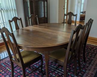 Antique Dining Room Table and Six chairs - $600. One chair has arms, the other five do not. 60" long, 54.5" wide (this piece was measured with the 11" leaf inserted).