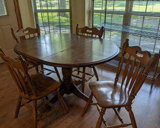 Oval Kitchen Table with 4 Chairs - $280.00 - Table is 53" long x 42" wide.