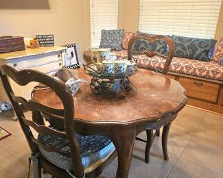country table with two chairs, perfect for morning coffee