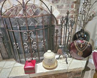 Curved fireplace mantel and tools