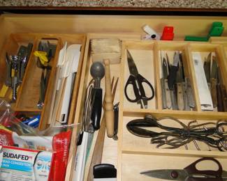 Cutlery, knives and scissor's. Looks like a darn drawer from the mid-evil times.