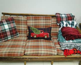 Heywood-Wakefield couch, and very comfy, wonderful throws and pillows