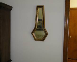 Mid Century Modern mirror, key hole punch design