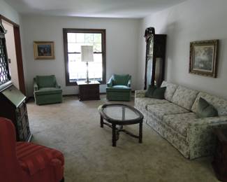 Pair of vintage chairs, matching sofa, and end table