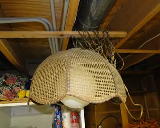 Of course the solid metal chain is wrapped around the beam like 5,500 times, but we have the matching table lamp