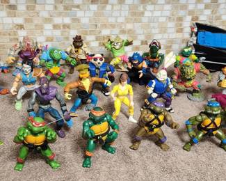 Vintage Teenage Mutant Ninja Turtle action figures and accessories
