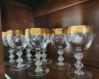 gold trimmed large and small goblets
