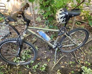 Motobecane bicycle with helmet