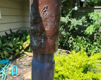 Lyman Whitaker signature on the copper wind scuplture