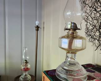 variety of antique oil lamps
