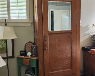 Antique armoire with mirror