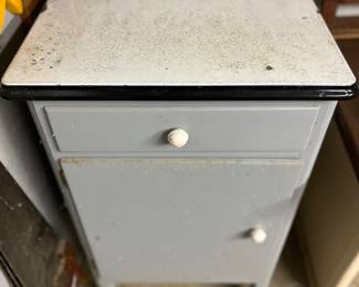 Cool little porcelain top cabinet 