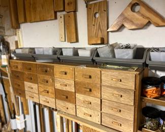 Useful homemade bins with hardware in each 