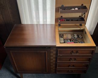 Vintage sewing machine with accessories ready to sew!