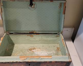 Interior of hand painted antique trunk