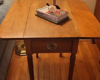small Biggs of Richmond, VA, double-drop leaf table, next to the sleeper sofa 